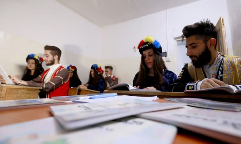 Students from the Syriac Christian minority attend a class in Qamishli