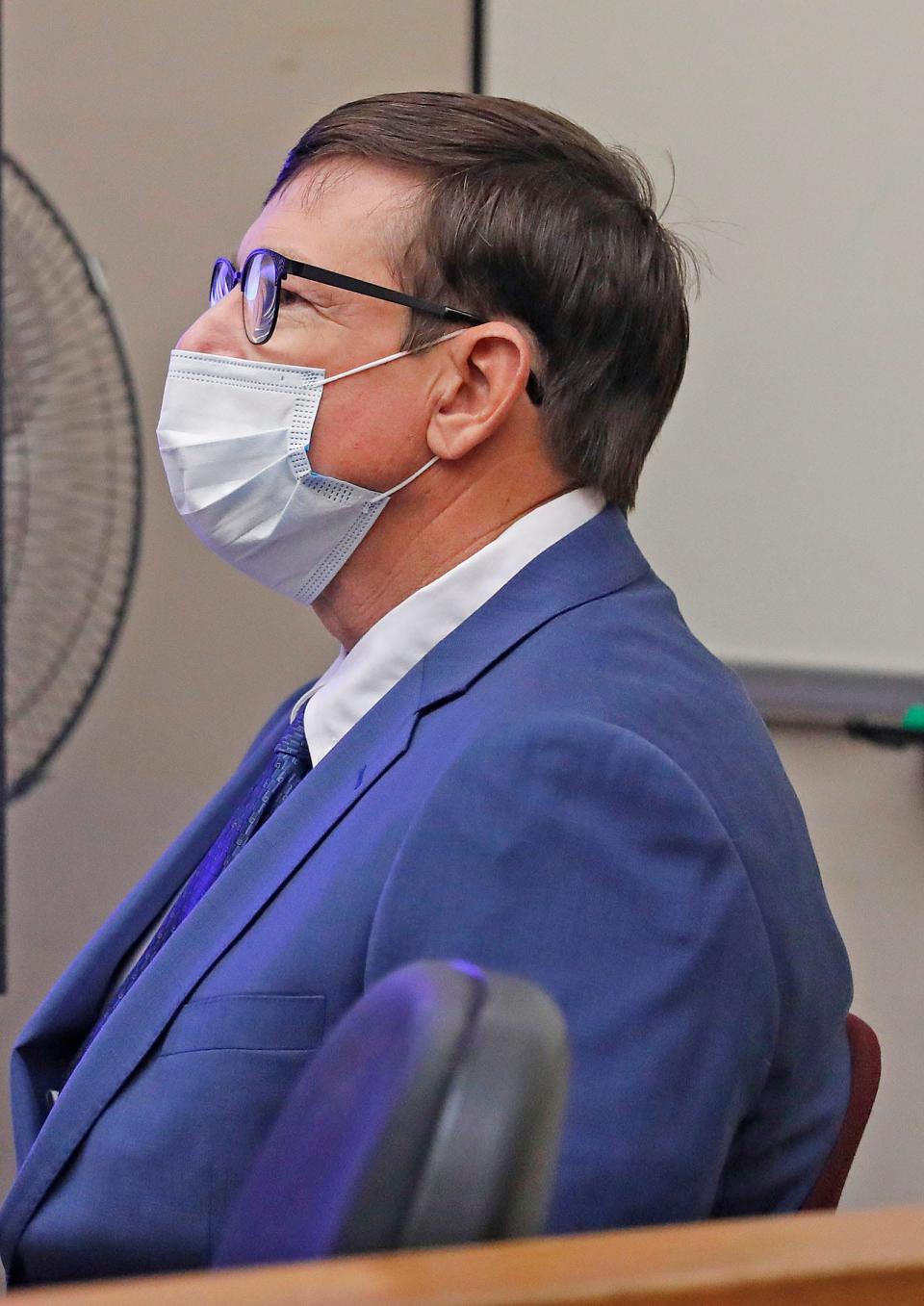Former Cohasset teacher Jeffrey Knight listens during the first day of his sexual assault trial in Quincy District Court on Monday, Nov. 15, 2021.