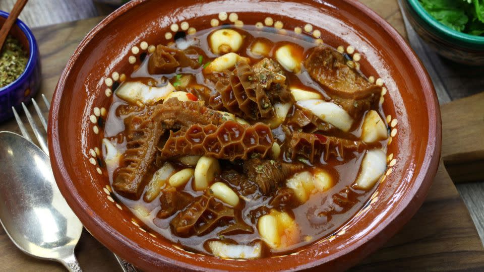 Menudo is a traditional Mexican soup made with tripe and hominy. It's touted for its curative effects for hangovers. - Shutterstock