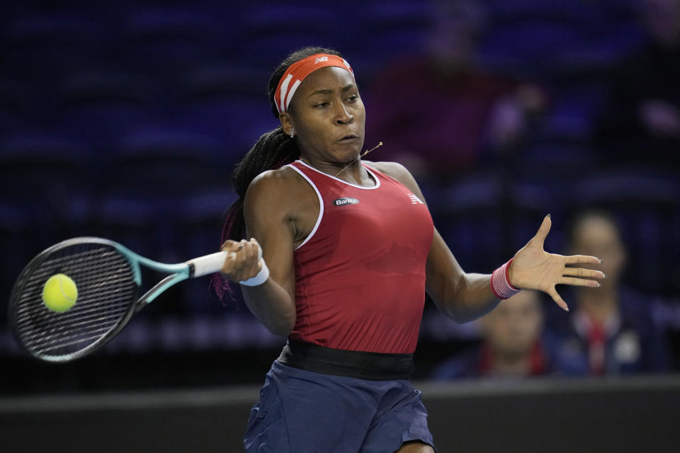 FILE - Coco Gauff plays a return to the Czech Republic's Katerina Siniakova on the 4th day of the Billie Jean King Cup tennis finals at the Emirates Arena in Glasgow, Scotland Friday, Nov. 11, 2022. The 2023 Grand Slam season begins at the Australian Open next week. (AP Photo/Kin Cheung, File)