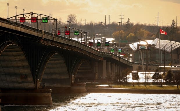 The Peace Bridge and the Canadian border are seen from Buffalo, N.Y., on April 22. Pressure is building on the U.S. side to get travel moving. (Lindsay DeDario/Reuters - image credit)