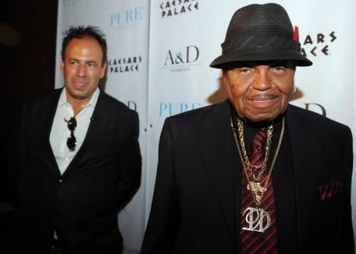 Joe Jackson (R) and French perfumer Julian Rouas stand apart at the launch of the new fragances, "Jackson Tribute" for men and "Jackson Legend" for women, in Las Vegas, Nevada, June 9. The botched launch of the perfume in memory of pop icon Michael Jackson caused a stink this week, as Joe Jackson distanced himself from Rouas and a lawsuit disputed their rights