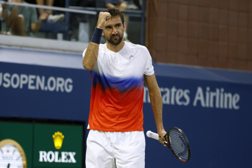 Marin Cilic, of Croatia, celebrates winning a point against Daniel Evans, of the United Kingdom, during the third round of the U.S. Open tennis championships, Saturday, Sept. 3, 2022, in New York. (AP Photo/Jason DeCrow)