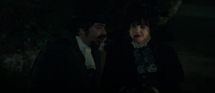 Laszlo and Nadja walking together at night in "What We Do in the Shadows"