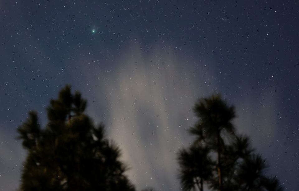 A green comet named Comet C/2022 E3 (ZTF), which last passed by our planet about 50,000 years ago, is seen from the Pico de las Nieves, in the island of Gran Canaria, Spain, February 1, 2023. (REUTERS)