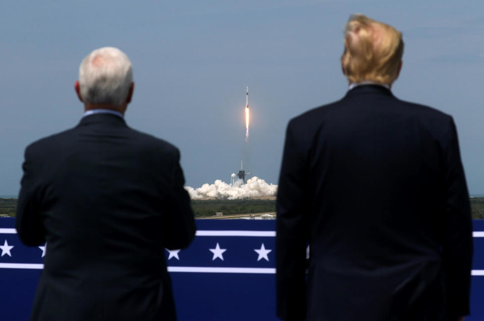 President Donald Trump and Vice President Mike Pence watch the launch of a SpaceX Falcon 9 rocket and Crew Dragon spacecraft, from Cape Canaveral, Florida, May 30, 2020. / Credit: JONATHAN ERNST / REUTERS