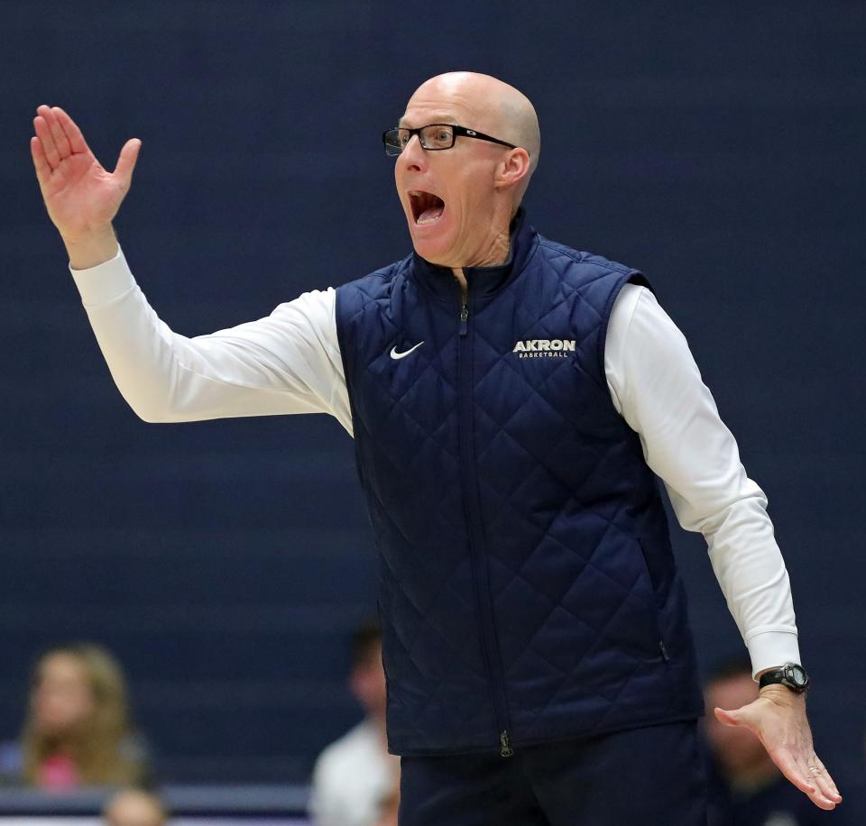 Akron coach John Groce calls out plays against Ohio on Tuesday in Akron.