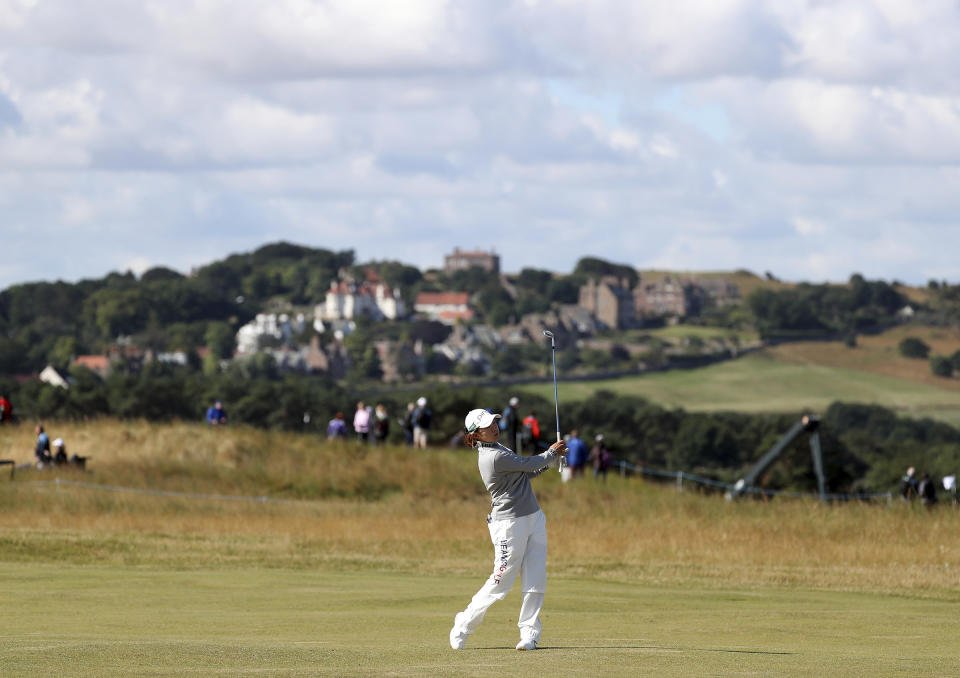 Japan's Hinako Shibuno plays her 2nd shot from the 11th fairway during the first round of the Women's British Open golf championship, in Muirfield, Scotland Thursday, Aug. 4, 2022. (AP Photo/Scott Heppell)