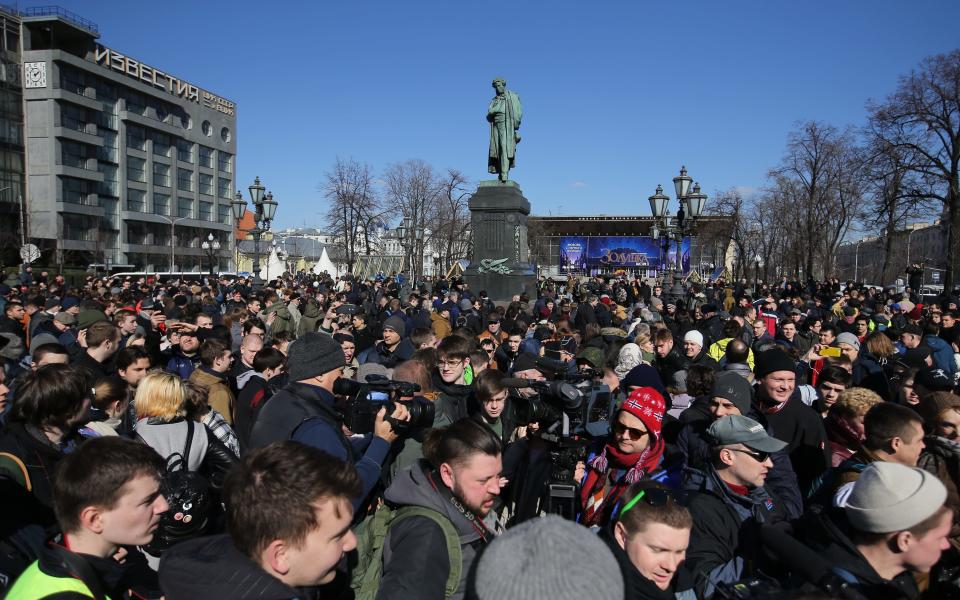 Demonstrators on Moscow's Pushkin Square on Sunday - Credit: TASS / Barcroft Images