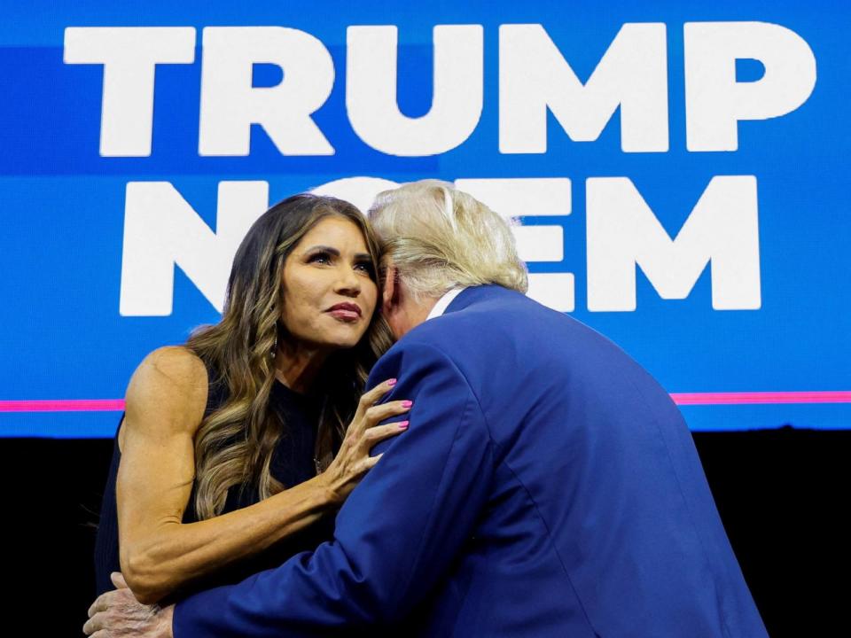 PHOTO: South Dakota Governor Kristi Noem greets former U.S. President and Republican presidential candidate Donald Trump before he speaks at a South Dakota Republican party rally in Rapid City, South Dakota, September 8, 2023. (Jonathan Ernst/Reuters)