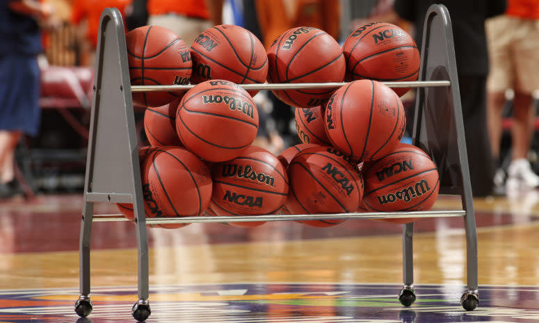 A rack of NCAA basketballs.