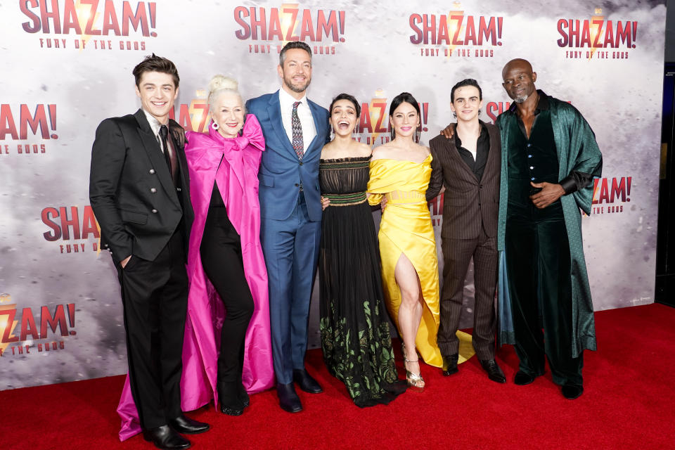 Asher Angel, Helen Mirren, Zachary Levi, Rachel Zegler, Lucy Liu, Jack Dylan Grazer and Djimon Hounsou pose for photographers upon arrival at the premiere of the film 'Shazam! Fury of the Gods' in London, Tuesday, March 7, 2023.(Photo by Alberto Pezzali/Invision/AP)