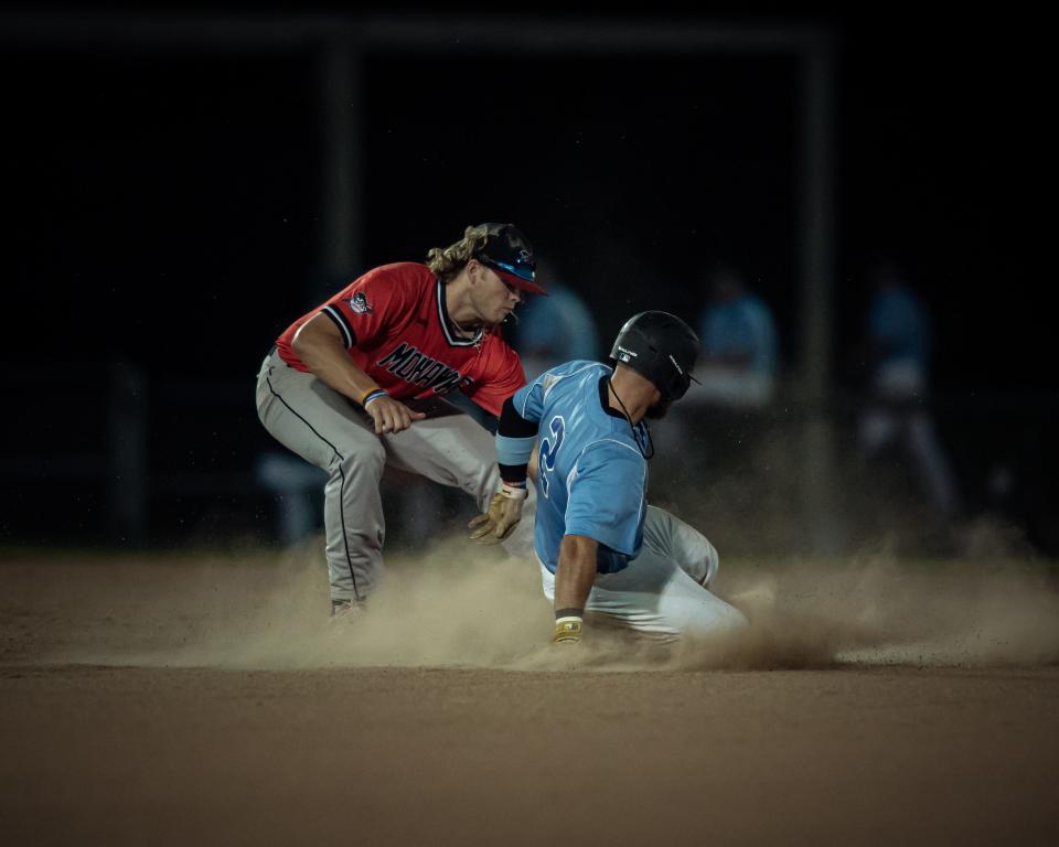 Brett Coker gets the tag on Ryan Enos as he slides into second as the Utica Blue Sox took on the Amsterdam Mohawks at Donovan Stadium in Utica on Friday, July 1, 2022.
