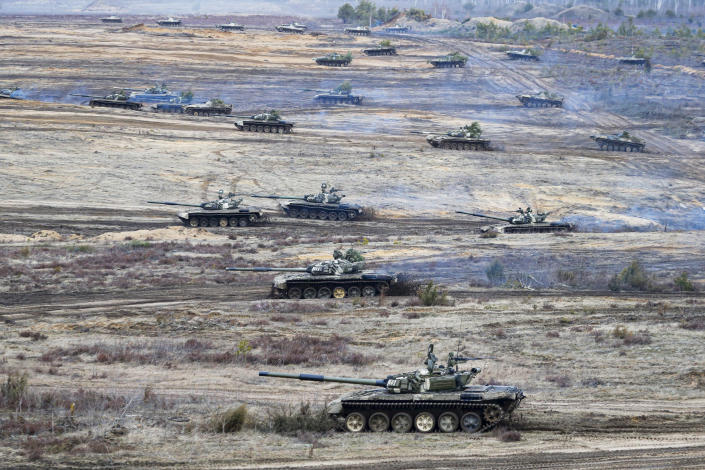 Tanks move during the Union Courage-2022 Russia-Belarus military drills at the Obuz-Lesnovsky training ground in Belarus on Feb. 19, 2022. (Alexander Zemlianichenko Jr. / AP)