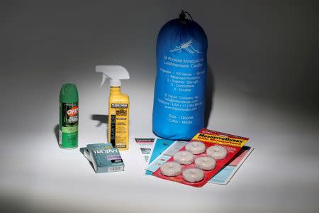 An anti Zika virus kit, including a bug net, mosquito repellent, condoms, literature and anti mosquito dunks, is pictured in this April 29, 2016 photo illustration. REUTERS/Carlo Allegri//Illustration/File Photo
