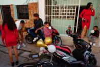 Bride and groom opt for electric motorcycles instead of limos amidst fuel shortage in Cuba