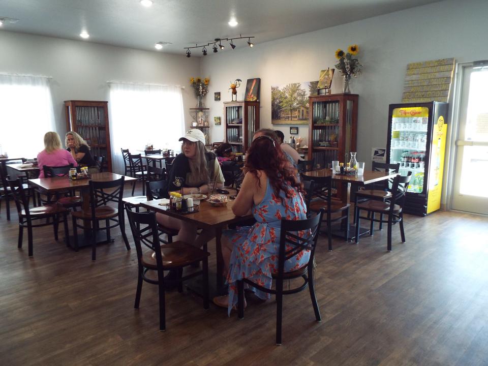 An overall look at the restaurant/winery called Honey Buzz Winery. It has become a popular destination point for travelers as well as locals. A large meeting room is also available for businesses and seminars.