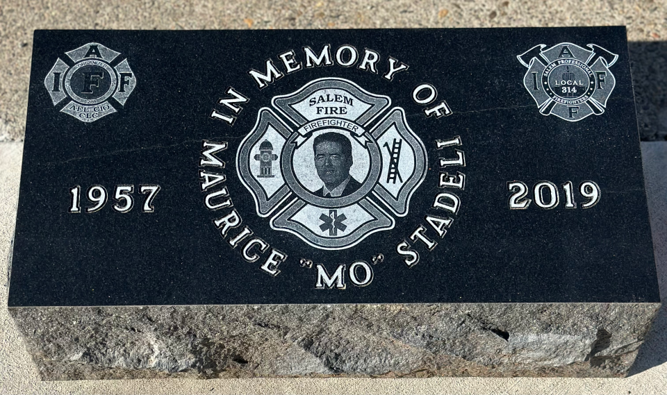 A memorial in honor of Maurice "Mo" Stadeli, a Salem firefighter who died of cancer in 2019.