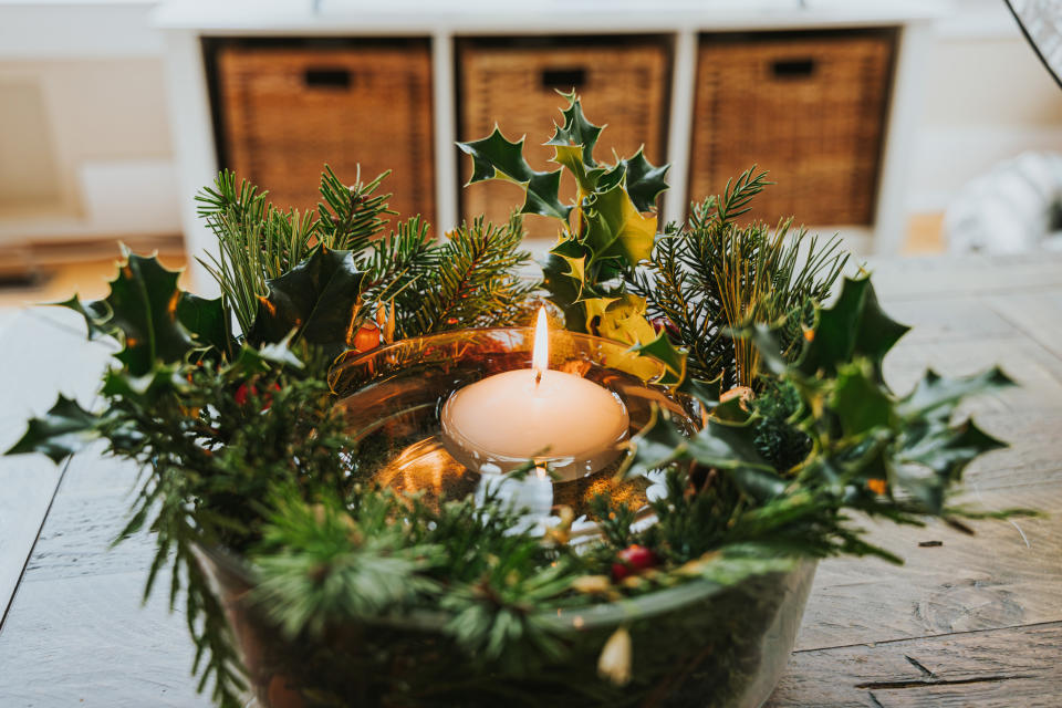 A festive centerpiece made with found items from nature, such as moss and branches. 