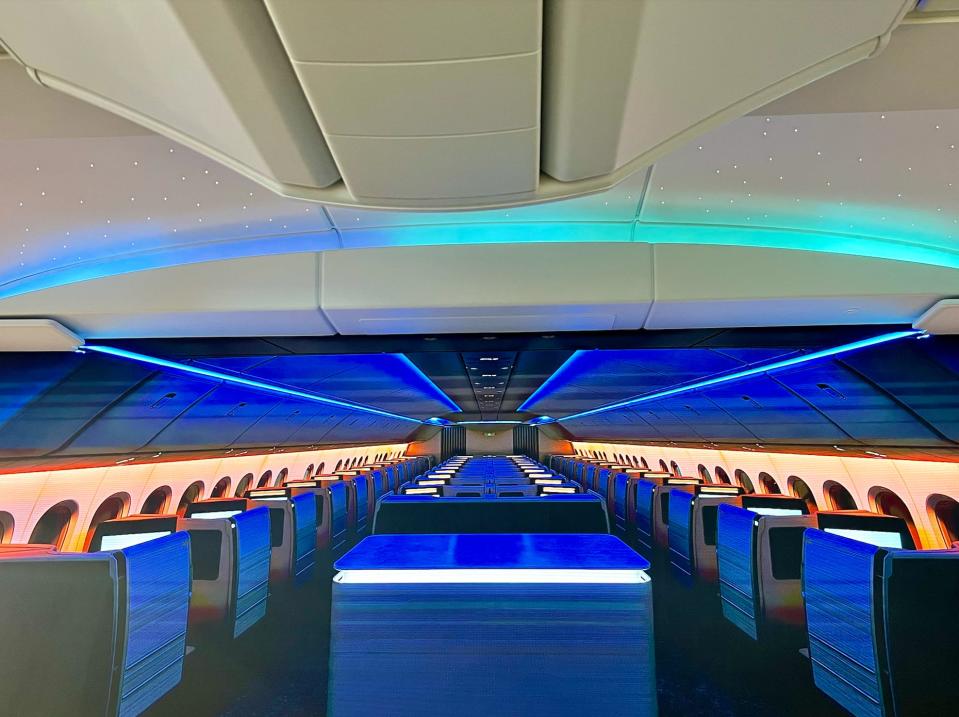 The blue and green lighting in the 777X digital cabin mockup.
