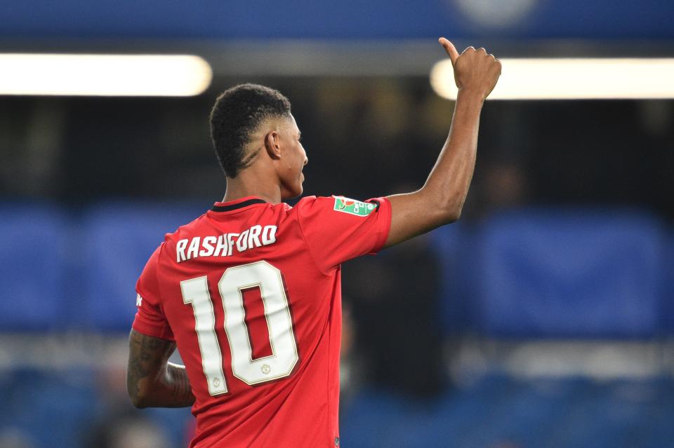 Manchester United's English striker Marcus Rashford gestures at the final whistle  during the English Leaguse Cup fourth round football match between Chelsea and Manchester United at Stamford Bridge in London on October 30, 2019. (Photo by Glyn KIRK / AFP) / RESTRICTED TO EDITORIAL USE. No use with unauthorized audio, video, data, fixture lists, club/league logos or 'live' services. Online in-match use limited to 75 images, no video emulation. No use in betting, games or single club/league/player publications. /  (Photo by GLYN KIRK/AFP via Getty Images)