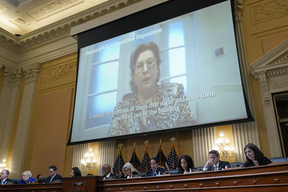 A video deposition from Sidney Powell, former Trump campaign attorney, is shown as the House select committee investigating the Jan. 6 attack on the U.S. Capitol holds a hearing at the Capitol in Washington, Tuesday, July 12, 2022. (AP Photo/J. Scott Applewhite)