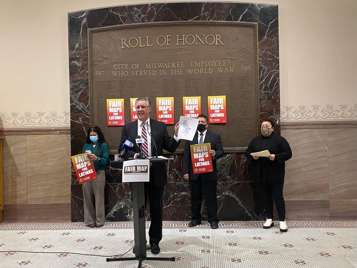 Latino advocacy groups rallied at Milwaukee City Hall on Friday to voice their concerns about the recent decision to re-adopt a redistricting map that had been previously vetoed by Mayor Barrett after seeing poor Latino representation in the redrawing of the city's aldermanic district lines.