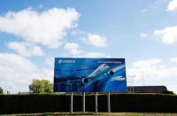A branded poster is seen at the entrance to Airbus' wing assembly plant at Broughton, near Chester, Britain, June 22, 2018. REUTERS/Phil Noble