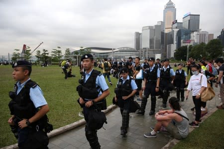 Police patrol following a day of violence in Hong Kong
