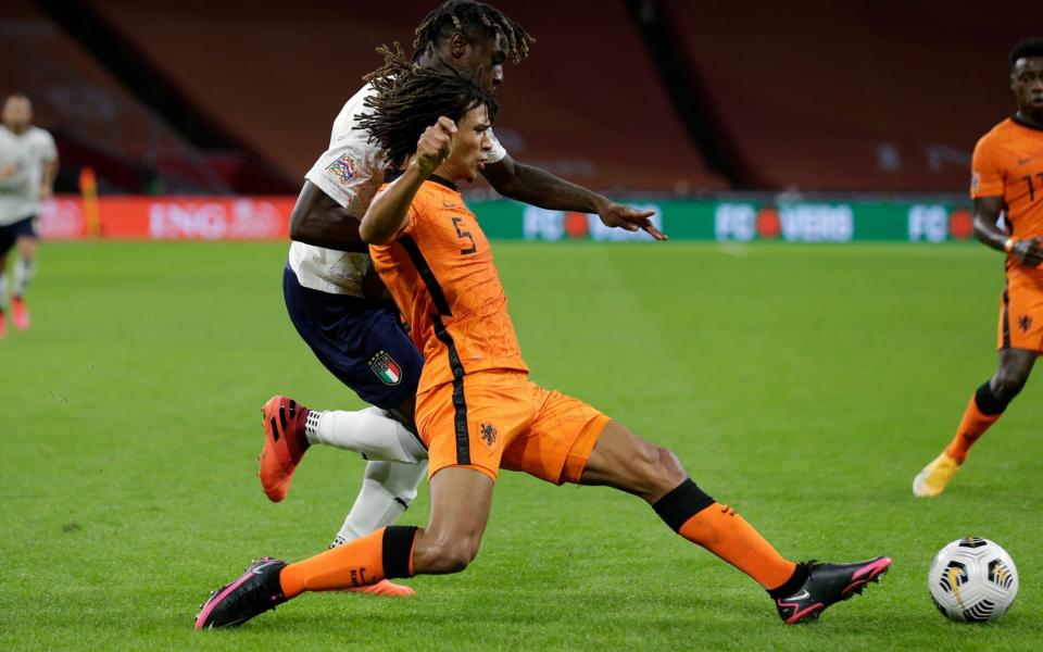 Moise Kean of Italy, Nathan Ake of Holland during the UEFA Nations league match between Holland v Italy at the Johan Cruijff ArenA on September 7, 2020 in Amsterdam Netherlands. - GETTY IMAGES