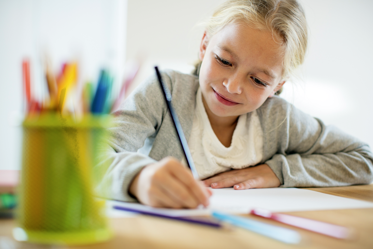 Young girl doing school work