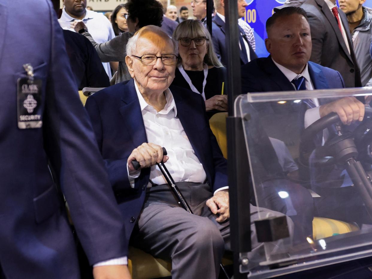 Warren Buffett in a golf cart