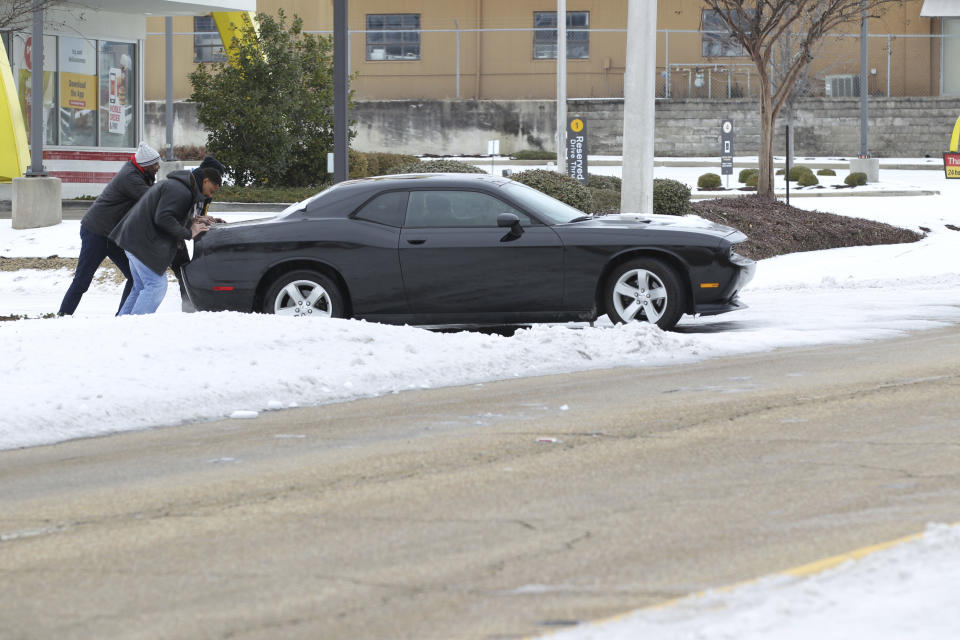 While many of the main roads in North Mississippi are open without much ice a vast majority of the side roads are still covered in layers of ice as this driver is affected Wednesday, Feb. 17, 2021, in Tupelo, Miss. (Thomas Wells/The Northeast Mississippi Daily Journal via AP)