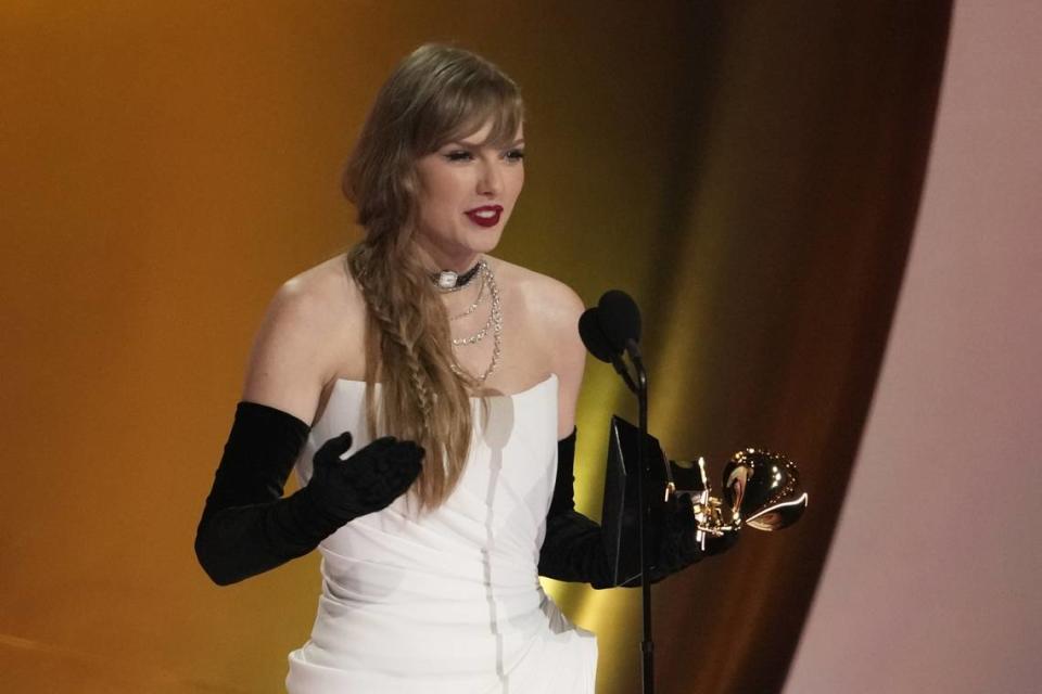 Taylor Swift shocked her fans by announcing a new album, “The Tortured Poets Department,” at the Grammy Awards on Sunday while she accepted the award for best pop vocal album, the 13th Grammy of her career. Robert Hanashiro/USA TODAY NETWORK