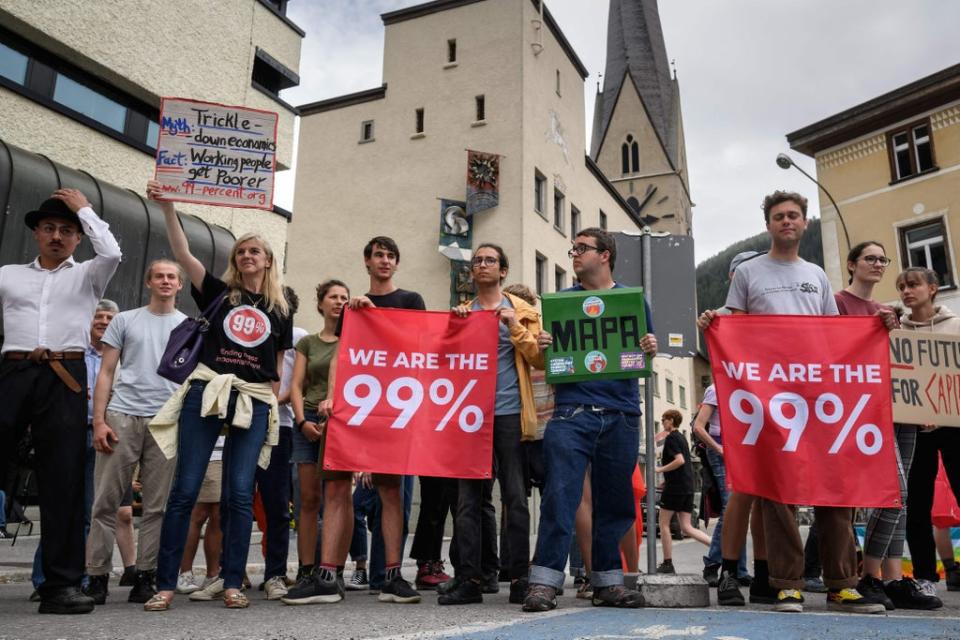 The millionaires joined protesters in Switzerland (AFP via Getty Images)