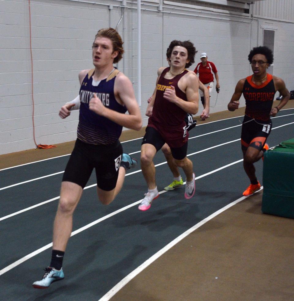 Smithsburg senior Cameron Rejonis leads Hereford's Ben Wheeler and Oakland Mills' Xavier Doctor on the way to winning the boys 500 in 1:08.93 in the Warrior Invitational indoor track and field meet at Hagerstown Community College on Jan. 13, 2023.
