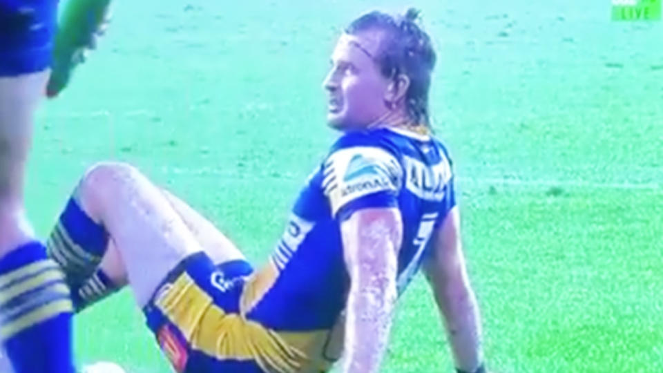 Clint Gutherson (pictured) stays on the ground after an apparent injury.