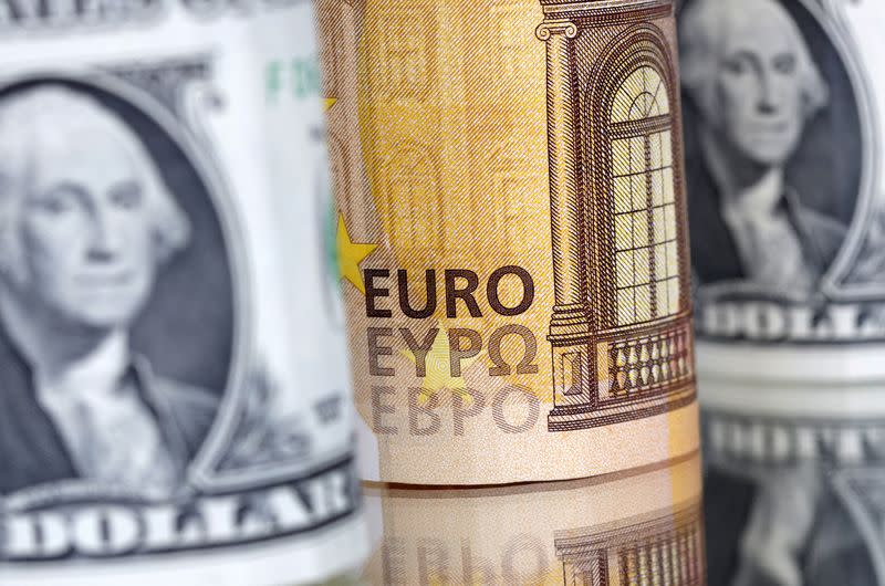 FILE PHOTO: Illustration shows U.S. Dollar and Euro banknotes