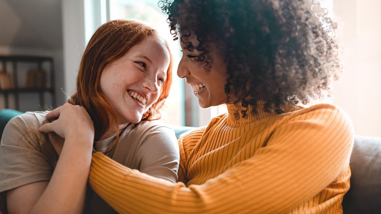 Two women embracing 