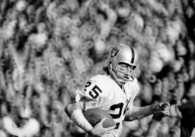 Carl Garrett of the Oakland Raiders carries the ball against the