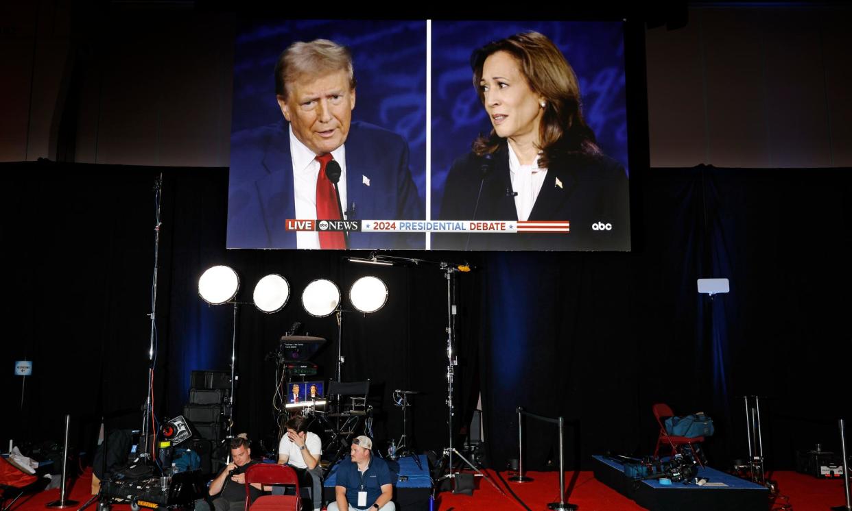 <span>The debate aired live on ABC from Philadelphia, Pennsylvania, with no audience in attendance and each candidate’s microphone muted while their opponent spoke.</span><span>Photograph: Chip Somodevilla/Getty Images</span>