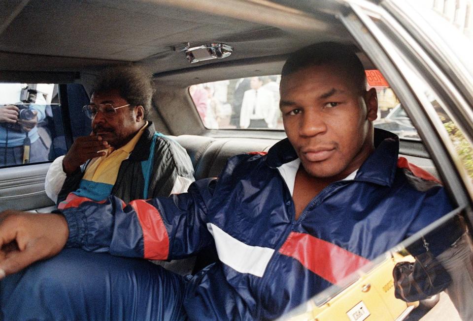 Mike Tyson with Don King.