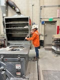 Sally Cianciolo, foundry sales manager for Heraeus Electro-Nite demonstrates and fixes equipment in foundries where metal is melted to make castings -- pouring molten metal into a mold, and letting it cool to solidify. She has worked in a sales role for the company since 1999.