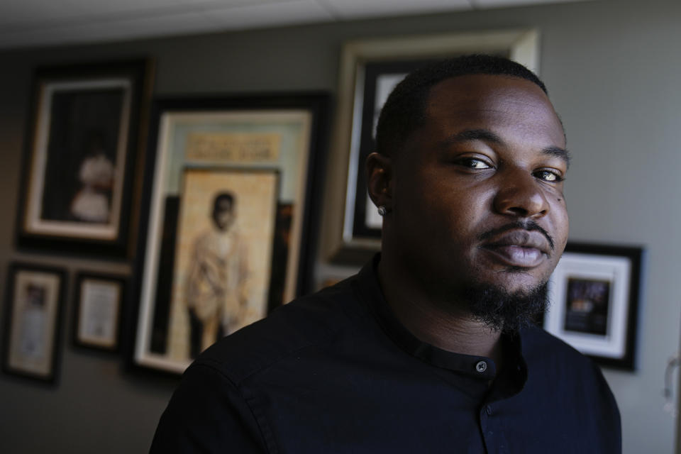 Randal Quran Reid poses for a portait at his attorny's office Wednesday, Sept. 20, 2023. Reid says the use of facial recognition technology by a sheriff's detective in Louisiana led to his arrest for crimes he did not commit. (AP Photo/John Bazemore)