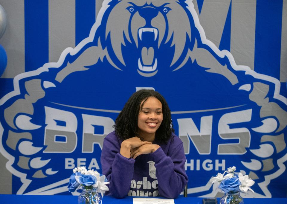 Bear Creek's Armani Guidry participates in a signing ceremony at the school Stockton. Guidry has committed to play volleyball for Goshen College.