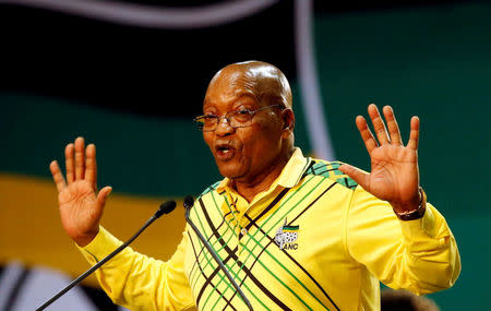 FILE PHOTO: President of South Africa Jacob Zuma gestures to his supporters at the 54th National Conference of the ruling African National Congress (ANC) at the Nasrec Expo Centre in Johannesburg, South Africa December 16, 2017. REUTERS/Siphiwe Sibeko/File photo