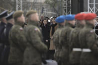 <p>President of Poland, Andrzej Duda (C) and his wife Agata Duda (C-R) attend the official celebrations of the 99th Anniversay of Independence of Poland at the Tomb of Unknown Soldiers, Warsaw, Poland on Nov. 11, 2017. (Photo: Omar Marques/Anadolu Agency/Getty Images) </p>