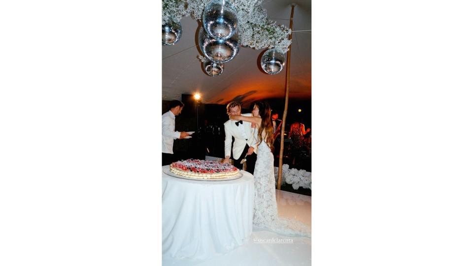 The couple celebrated with a giant Millefoglie wedding cake made in front of them at their wedding reception