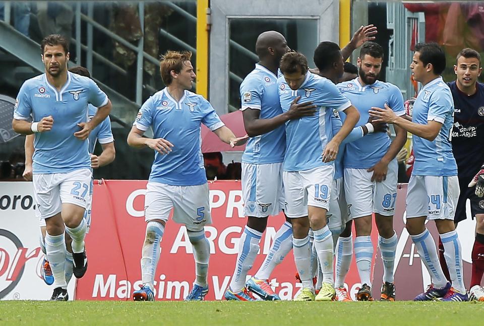 Lazio's Antonio Candreva, third from right, celebrates with teammates after scoring during a Serie A soccer match between Livorno and Lazio, in Leghorn, Italy, Sunday, April 27, 2014. (AP Photo/Francesco Speranza )