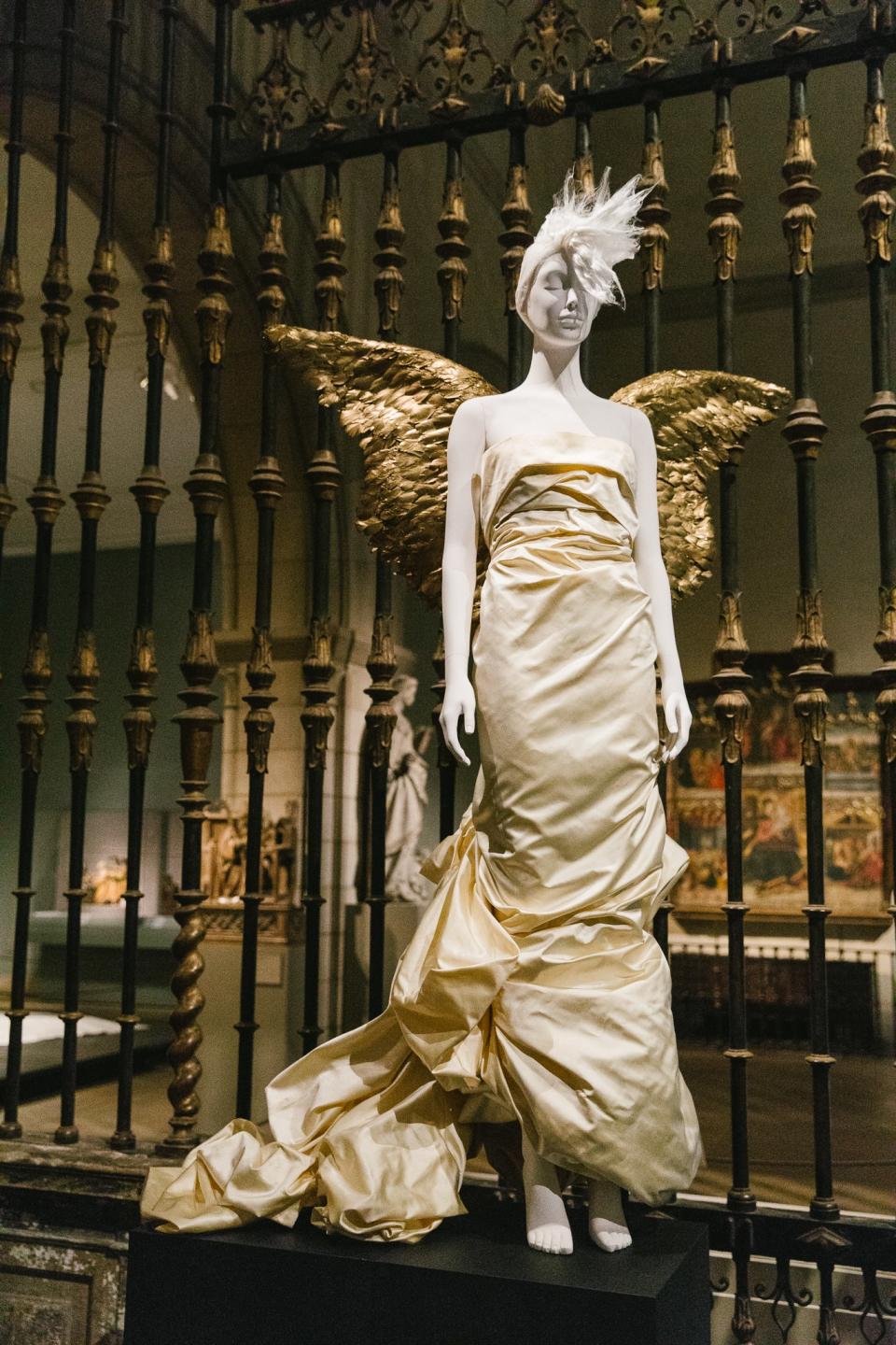 Mugler (French, founded 1974). Thierry Mugler (French, born 1948). Ensemble, Autumn/Winter 1984–85. Ivory silk taffeta and gold-painted feathers.